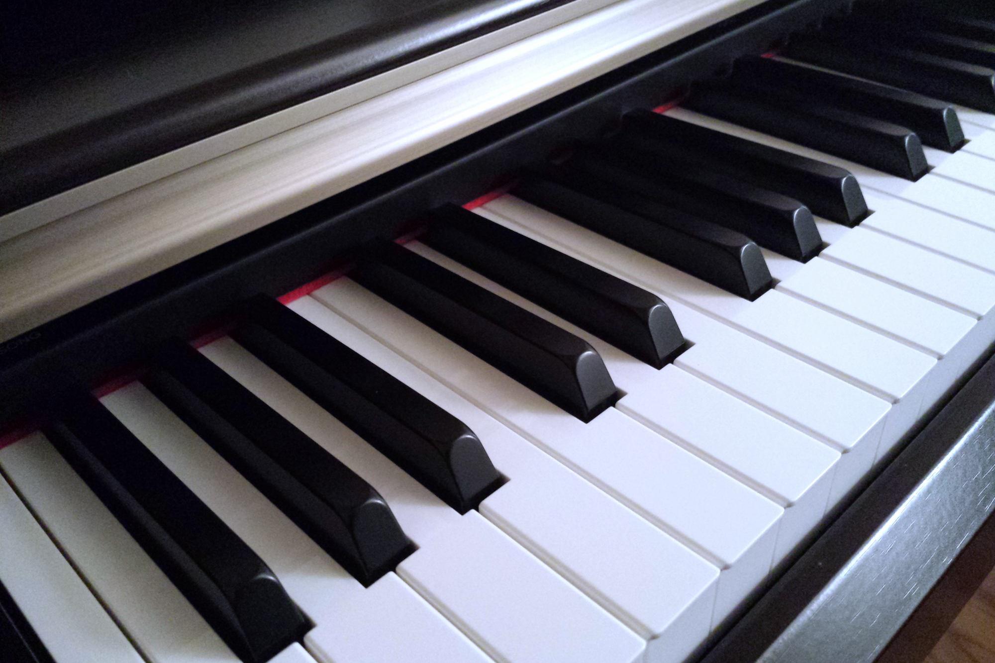 Close-up photo of the keys of a piano